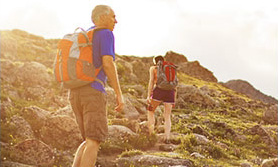 Hiker climbing mountain